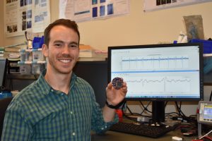 James Rosenthal holding the NeuroDisc prototype