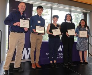 ECE award recipients on stage at the CoE