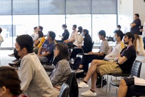 People sitting, listening to a speaker at the IFDS 2022 workshop