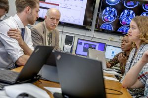 Wunsch sitting with research team at Missouri S&T