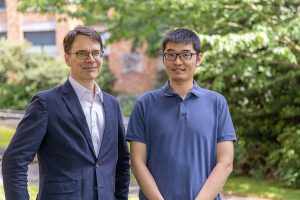 UW ECE Professor and Chair Eric Klavins with Luyao Niu, recipient of the Outstanding Mentorship Award in Electrical and Computer Engineering
