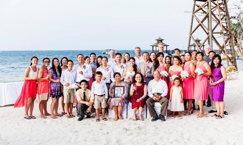 Tran with three generations of her extended family, attending her brother Phuc’s wedding in Jamaica in 2014.