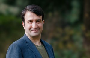 A headshot of UW ECE Assistant Professor Hossein Naghavi